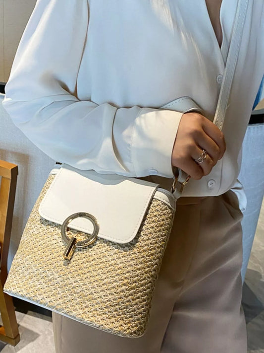 Woven straw crossbody bag with faux-leather trim and front pocket, summer shoulder bag