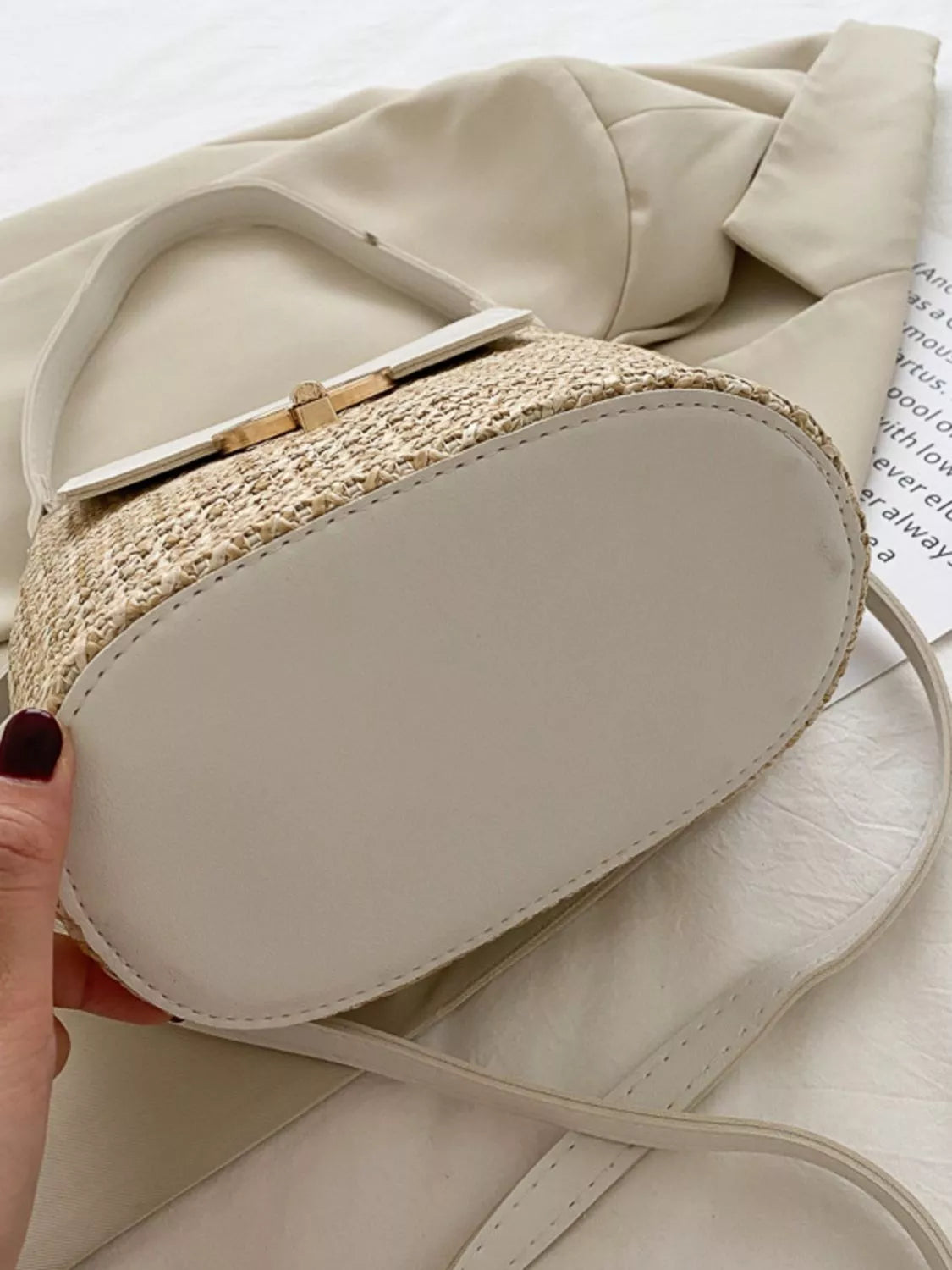 Woven straw crossbody bag with faux-leather trim and front pocket, summer shoulder bag-bottom
