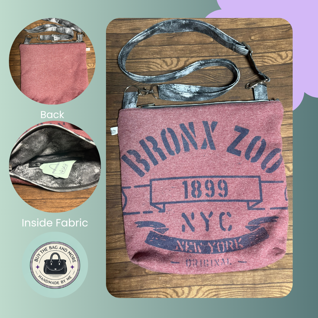 Pink bag with 'Bronx Zoo 1899 NYC' text on a wooden surface, showing back and inside fabric views.